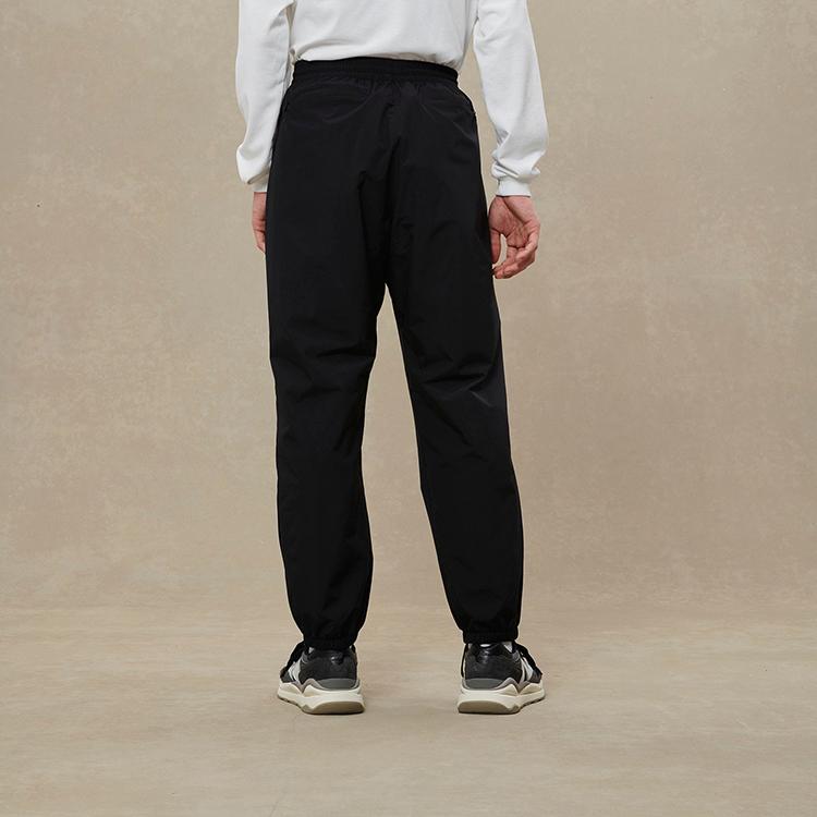 New Balance Knitted Sweatpants Men's Black Moderate Cuffed Pants AMP25016-BK
