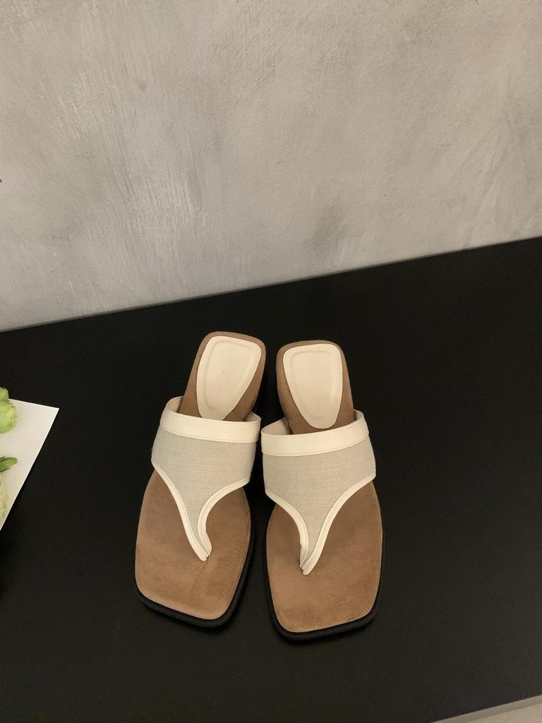 Fairy wind slope heel muffin thick-bottomed flip-flops women wear 2025 new French niche square toe cool slippers