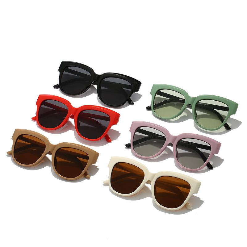 Simple designer personalized cat eye large frame sunglasses for men and women, retro candy contrasting color YK sunglasses
