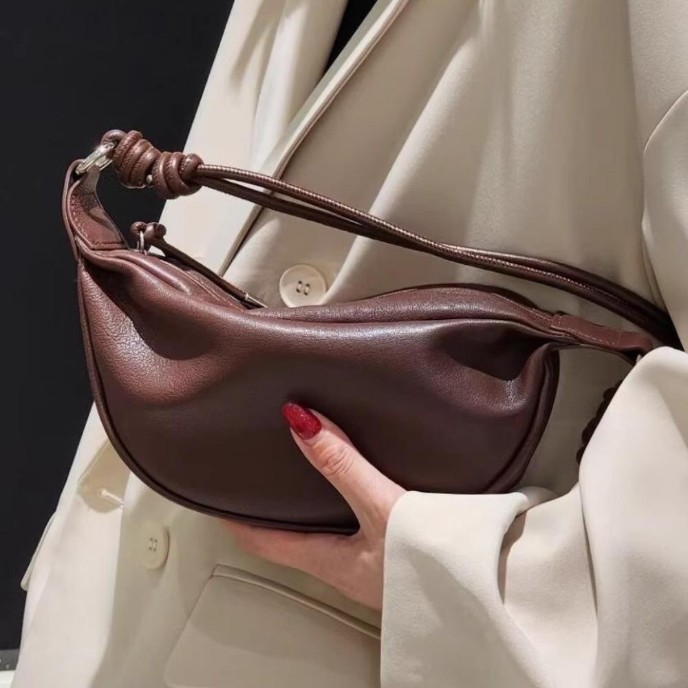 

Новый стиль 2025 Кожа воловья Кожа Сумка в форме коровьего рога Новый стиль Минималистичный дизайн Натуральная кожа Мягкая текстура Универсальная Одноплечевая Сумка в форме лошадиного рога 24x14x6cm кофейный