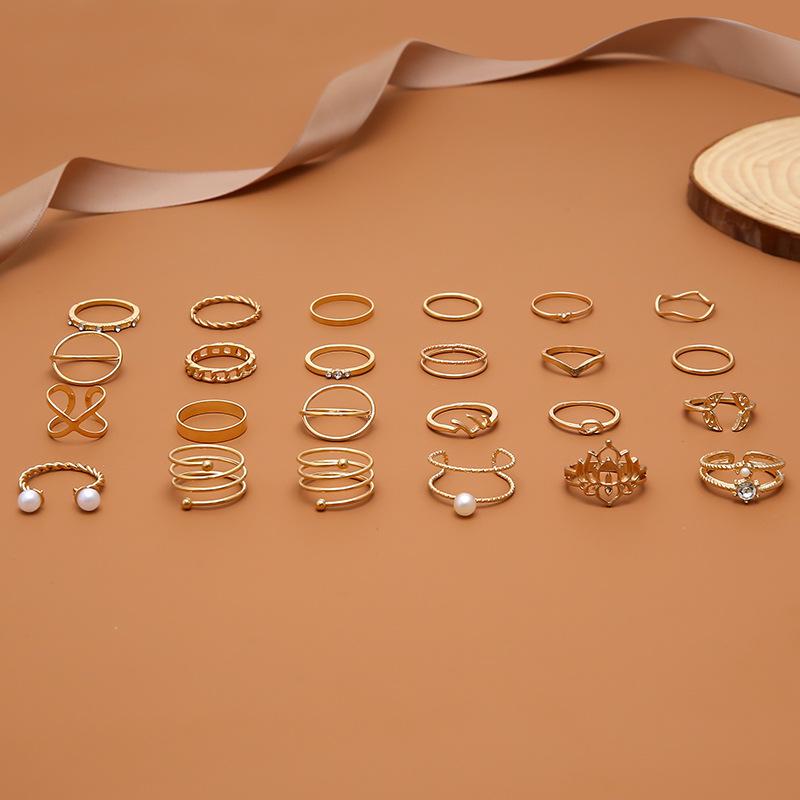 

Популярное кольцо с жемчугом с открытым верхом, европейская и американская мода, весеннее перекрестное кольцо, преувеличенный набор из 24 предметов с комбинацией лотоса для женщин
