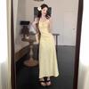Yellow suspender dress women's summer new French waist design seaside vacation floral long skirt