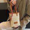Niche lightweight versatile rainbow straw mobile phone bag spring and summer explosion leisure vacation style commuter messenger bag woman