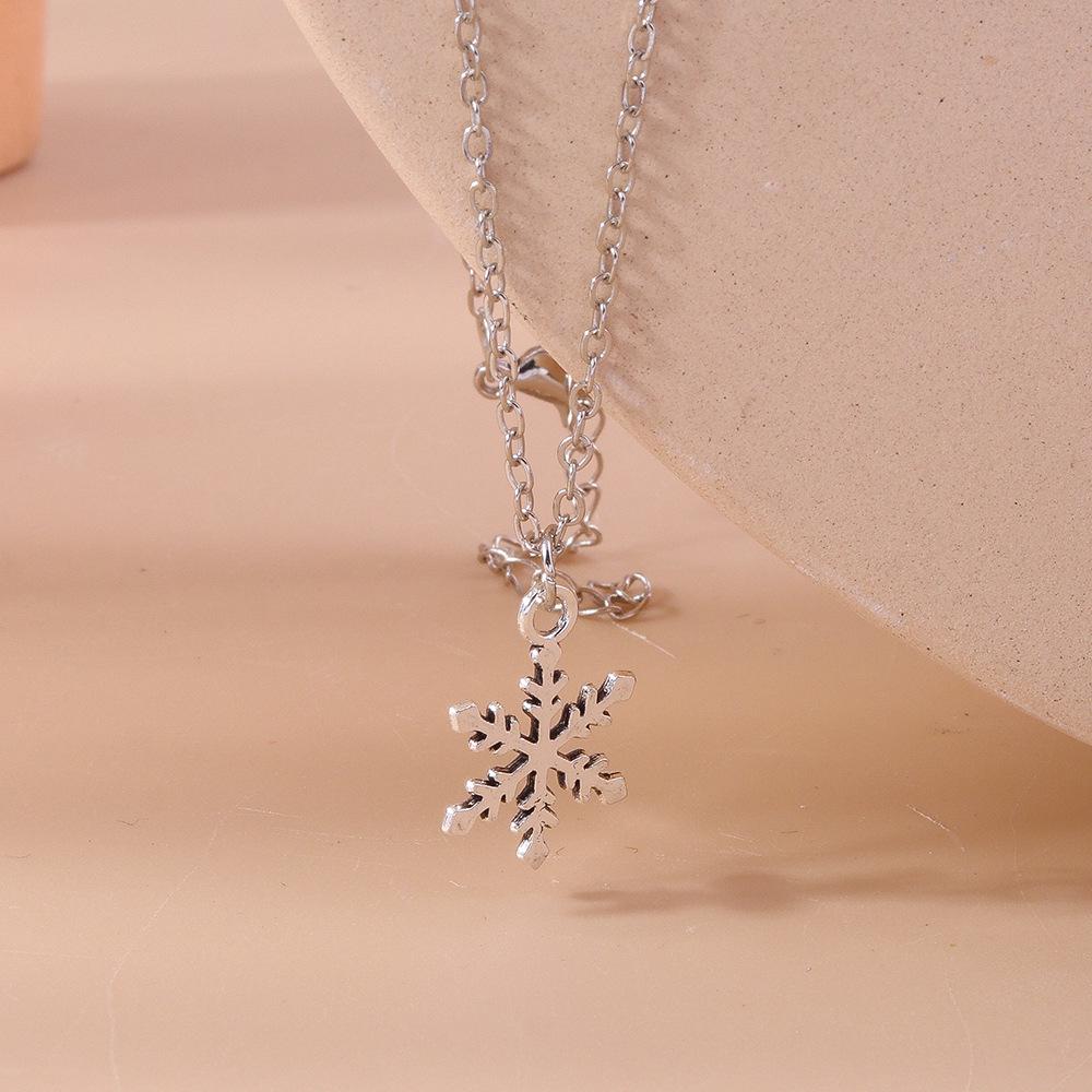 

Alloy Christmas Necklace: Snowflake, Snowman & Candy Cane Charms