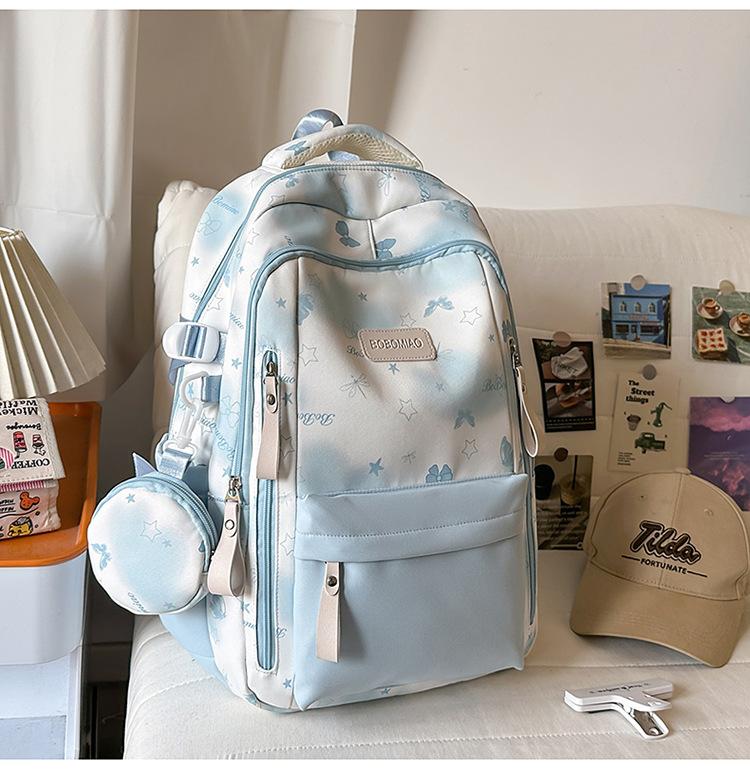 Cartable grande valeur petit frais doux fille sac à dos mignon dessin animé sac à dos grande capacité collège étudiant sac d'école