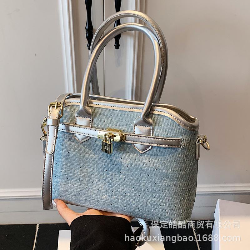 Hand bag women's 2025 new trendy high-end sense retro fashion versatile commuter shoulder bag crossbody bucket bag