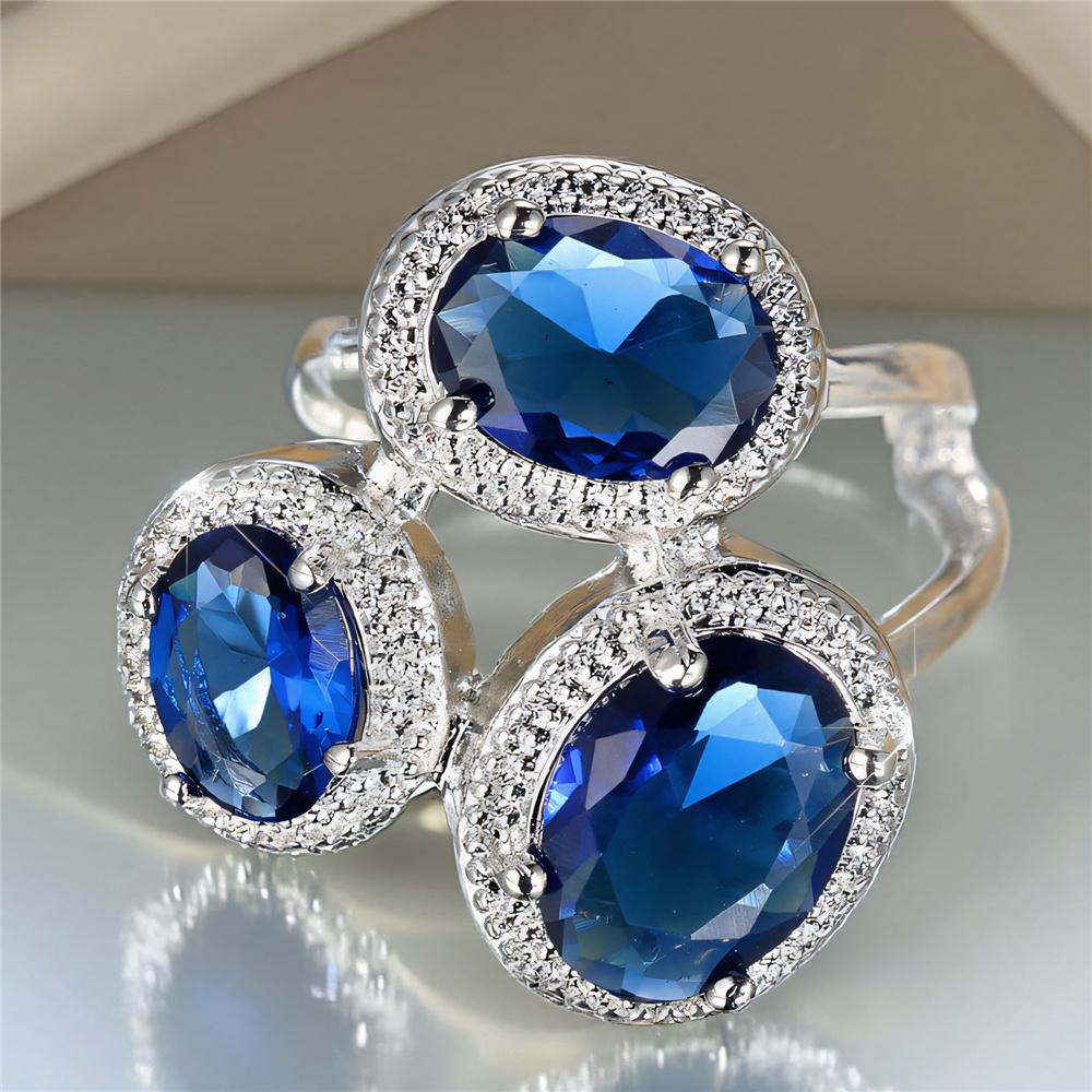Süße Damen blaue Zirkonstein Silberfarbe Hochzeit Versprechen Verlobung Weizenringe für Frauen