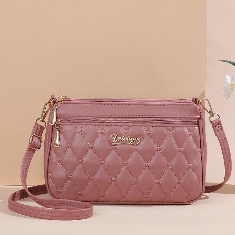 New summer simple fashion solid color embroidered messenger bag tide