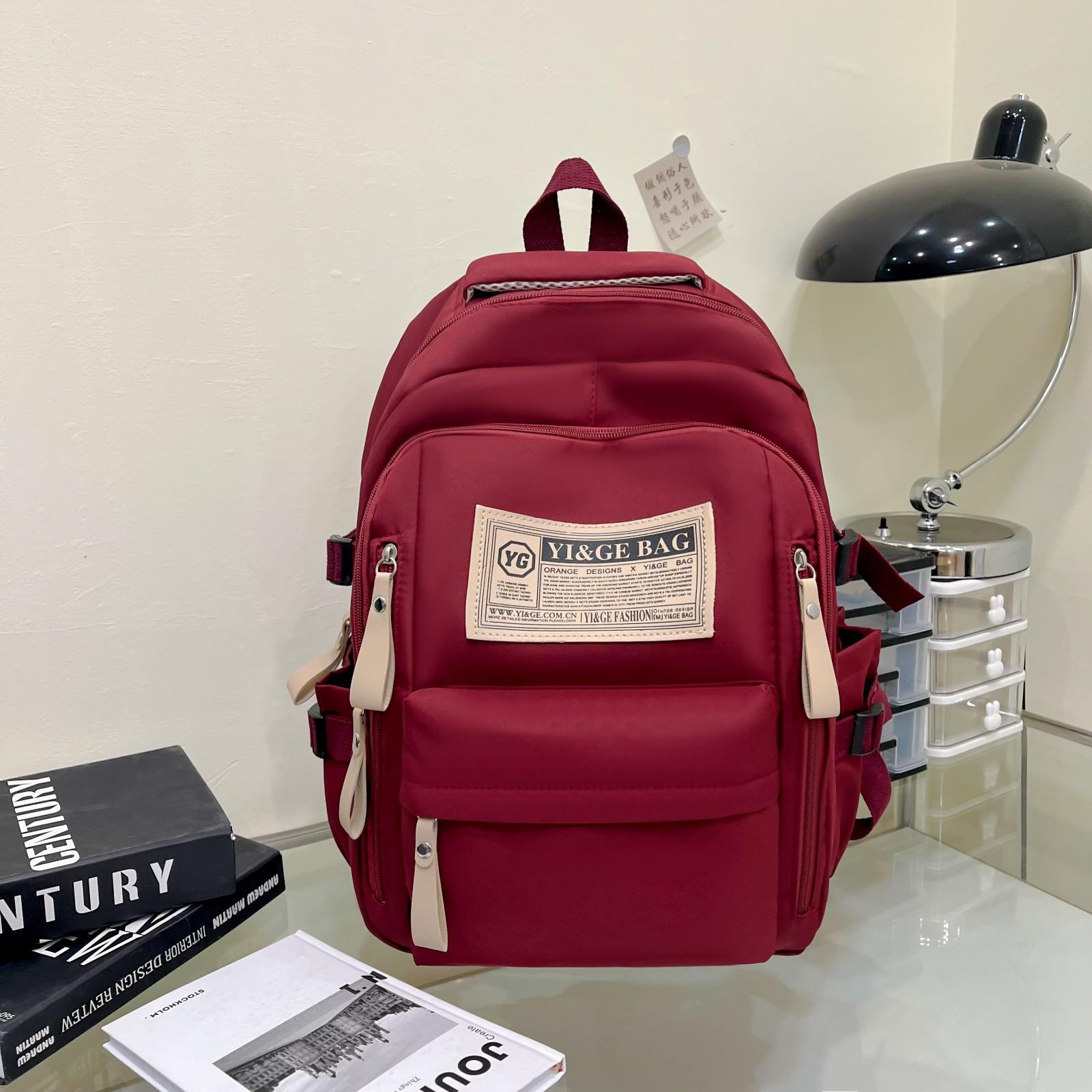 

Versatile college student schoolbag female, campus high school junior high school student backpack large capacity backpack червоний