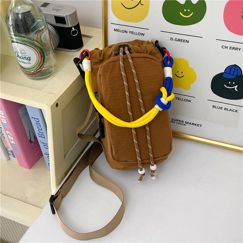 Women's Nylon Color Block One-Shoulder Crossbody Bag with Woven Lanyard, Lightweight and Stylish.