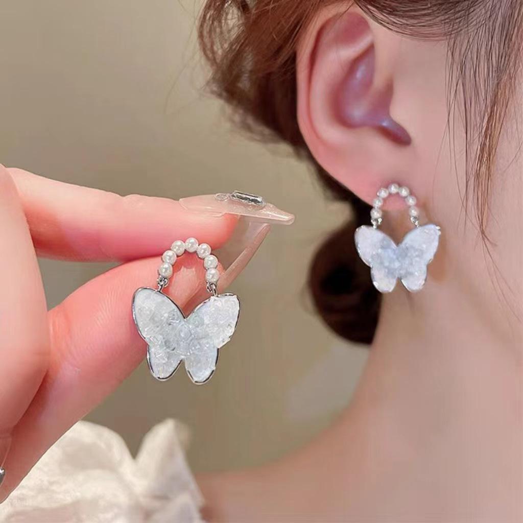Orecchini con Nappa di Perle 2024: Gioielli di Design di Nicchia, Eleganti e di Alta Gamma