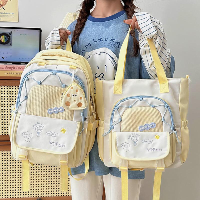 Schoolbag large-capacity schoolbag female high-value high school college student embroidery contrasting color backpack simple Japanese design sense 