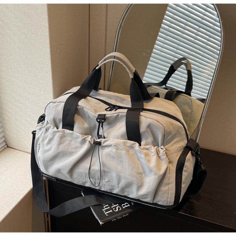 Large capacity messenger business travel luggage women's new leisure sports fitness portable short-distance travel bag