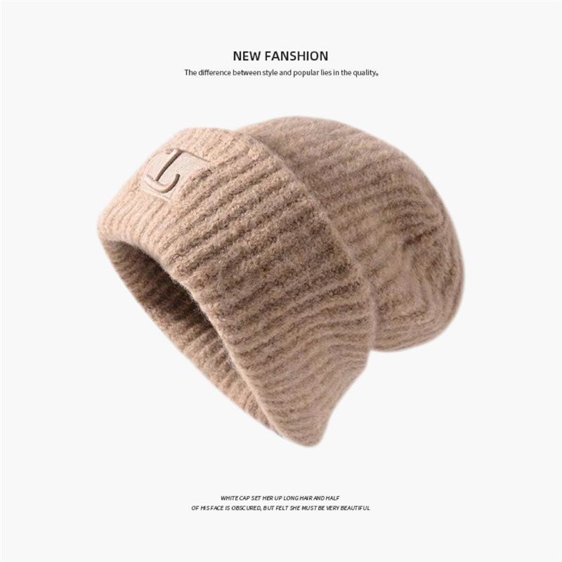 Autumn and winter warm wool hat, hand-woven hollow bald hat, women's fringed ear protector, sleeves, knitted hat