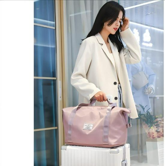 Foldable Waterproof Carry-on Travel Bag - Women's Large Capacity for Business, Fitness, and Yoga.