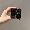 Black Satin Pearl Double-Sided Mini Bow Claw Hair Clip - Small Size for Bangs and Flyaways.