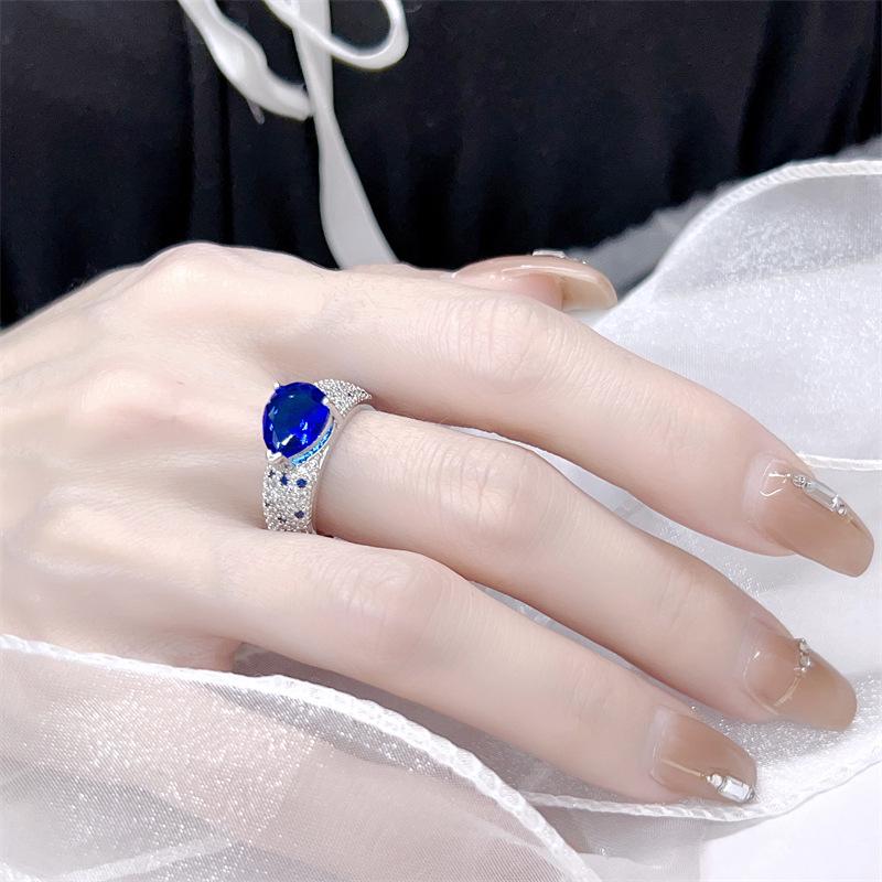 Elegant Adjustable Sapphire-Colored Gemstone Ring for Women with Micro-Paved Zircon Diamonds - Versatile and Stylish Gift.