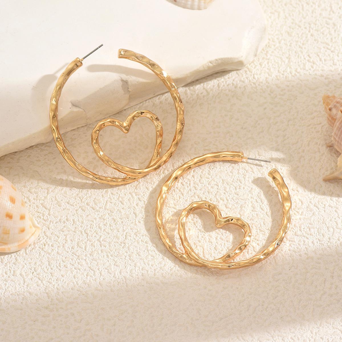 Gold earrings wholesale European and American jewelry accessories new niche light luxury high-end plain ring love earrings women