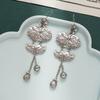 JMXD-Trendy Lotus Leaf Lucky Bag Earrings Retro Ethnic Style Old Lotus Leaf Small Flowers Exaggerated Long Fringed Earrings