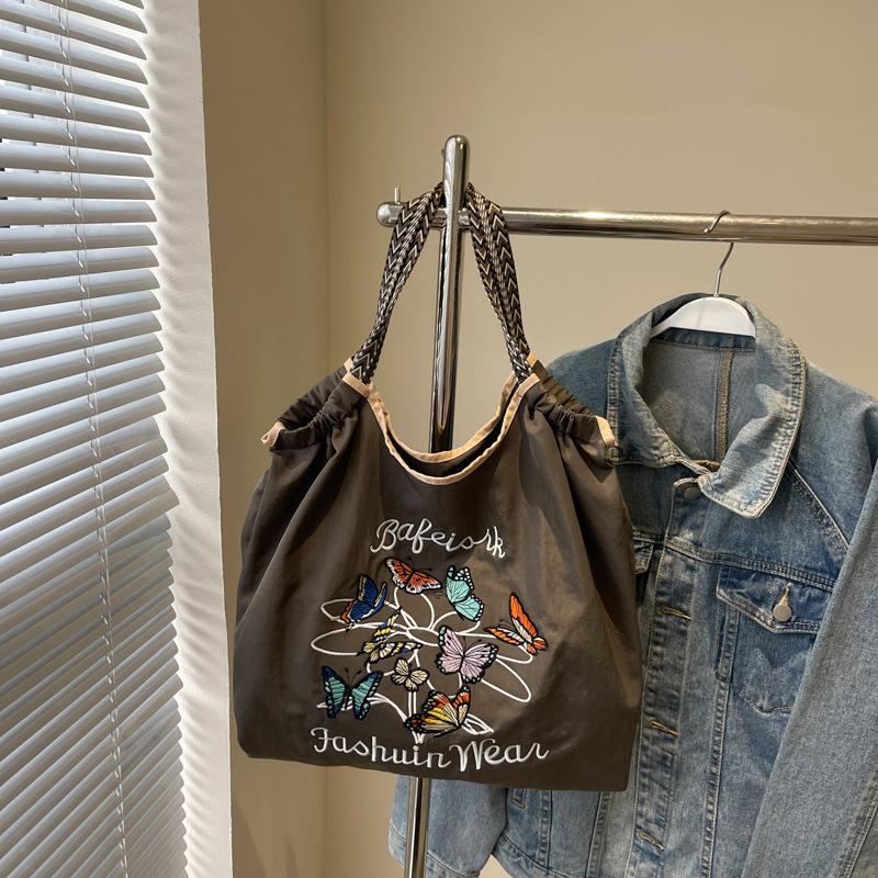 

Travel bag Embroidery women s bag Shoulder bag Nylon bag Waterproof tote bag Internet celebrity nylon bag Handheld messenger bag серый