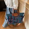 Large capacity short-distance travel bag Women's travel portable tote bag Tide commuter leisure shoulder bag Foreign style messenger bag