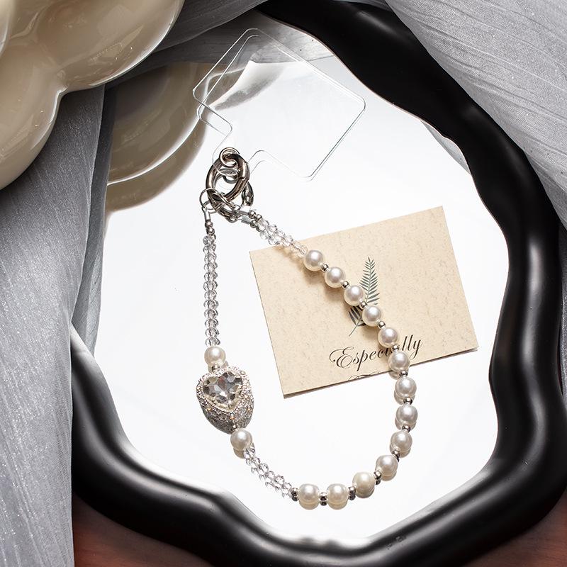 

Белый браслет на запястье для мобильного телефона с бусинами из жемчуга в форме сердца и блестками