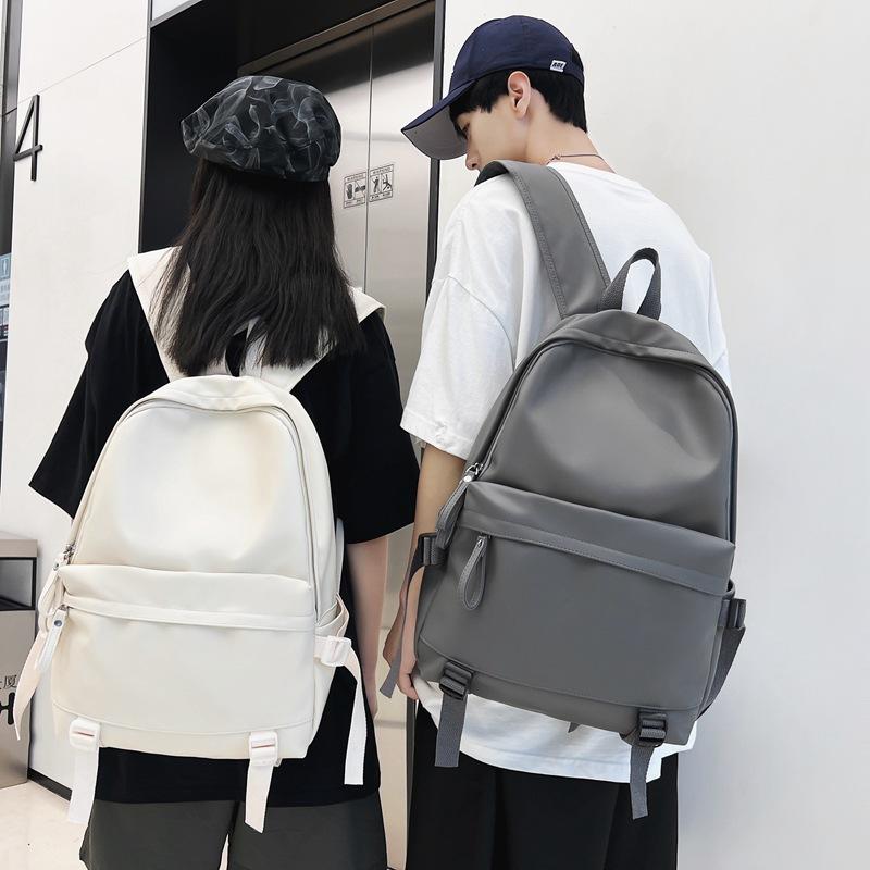 Cool backpack men's leather PU large-capacity college style casual backpack Japanese simple college student schoolbag women