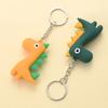 Uroczy breloczek kreskówkowy mały dinozaur zawieszka do torby wisiorek wysokiej jakości mini breloczki