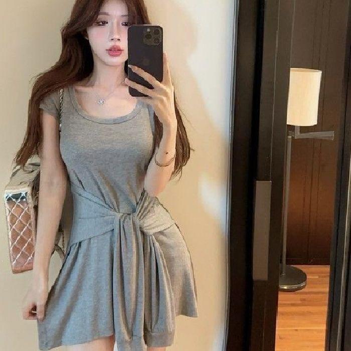 Casual style short-sleeved hip skirt niche design sense straps fake two-piece dress female sexy temperament royal sister short skirt
