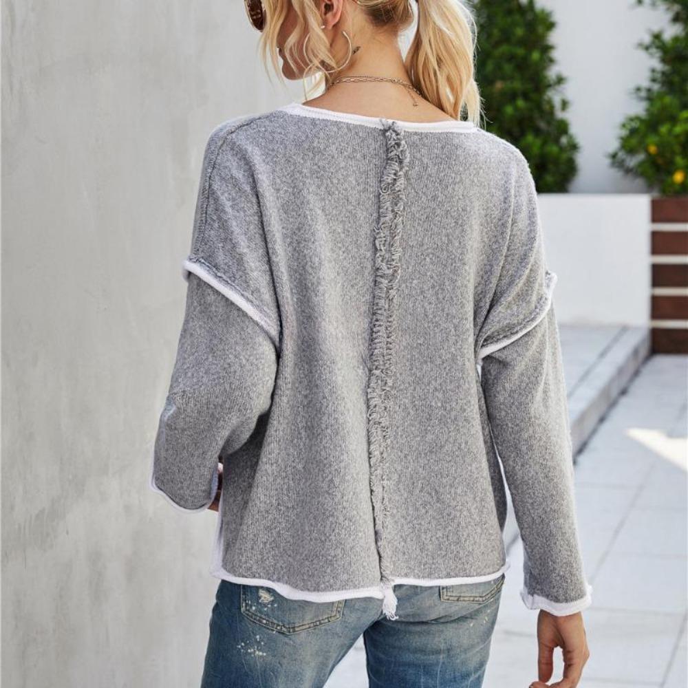 Женский вязаный свитер с круглым вырезом и кисточкой на спине — фото 7