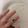 Black and white double-sided drip glaze love necklace 2025 trendy light luxury niche peach heart sweater chain accessories