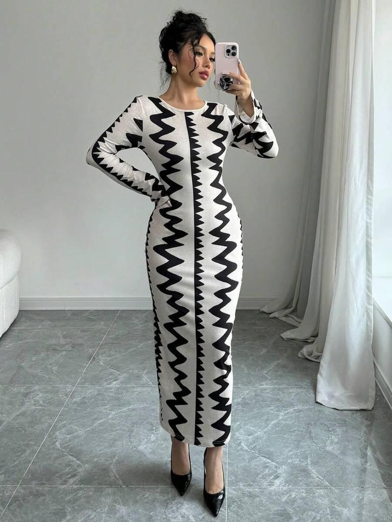 Evropské a americké podzim/zima 2025 přiléhavé šaty s černobílým potiskem, kulatým výstřihem a dlouhými rukávy