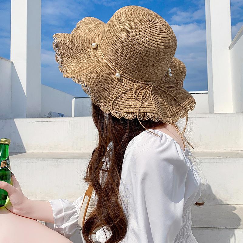 Straw hat women's small fresh and versatile pearl tether bow hat women's summer outing big eaves beach sun hat