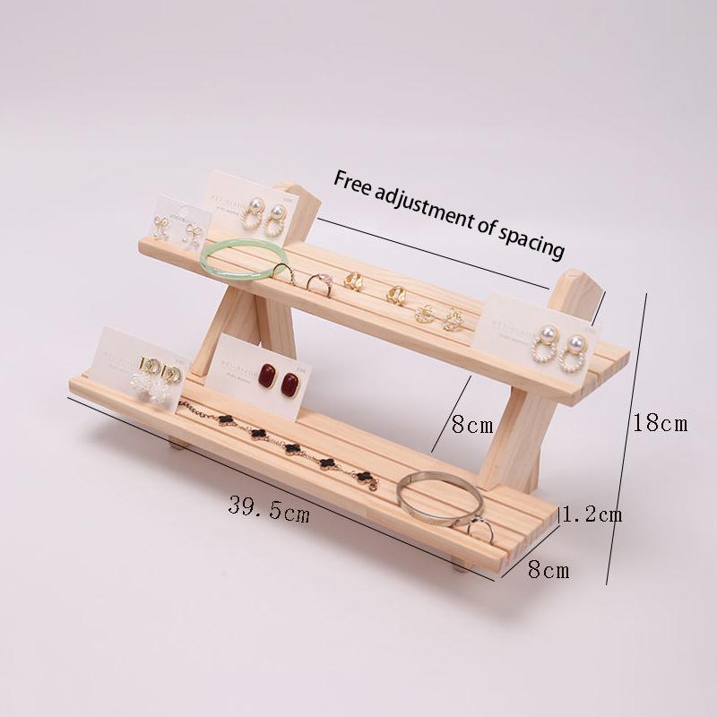 Flerlags utstillingsstativ Loggring Øredobbknapp Utstillingsstativ Avtakbart Øredobbkort Smykkestativ Dukkehånd Visning