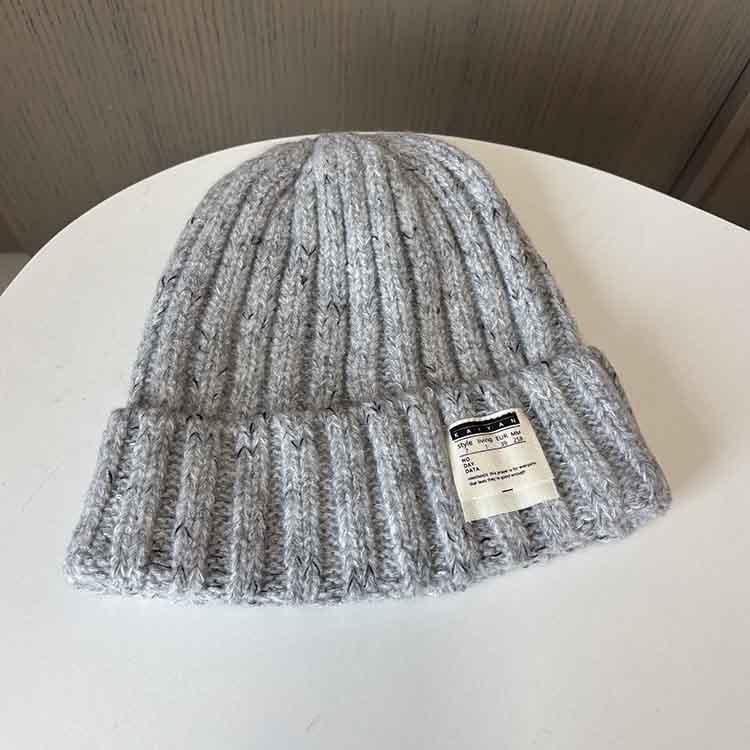 Women's autumn and winter wool jacquard letter labeling wool hat casual thermal bald hat women's loose knitted stacking hat