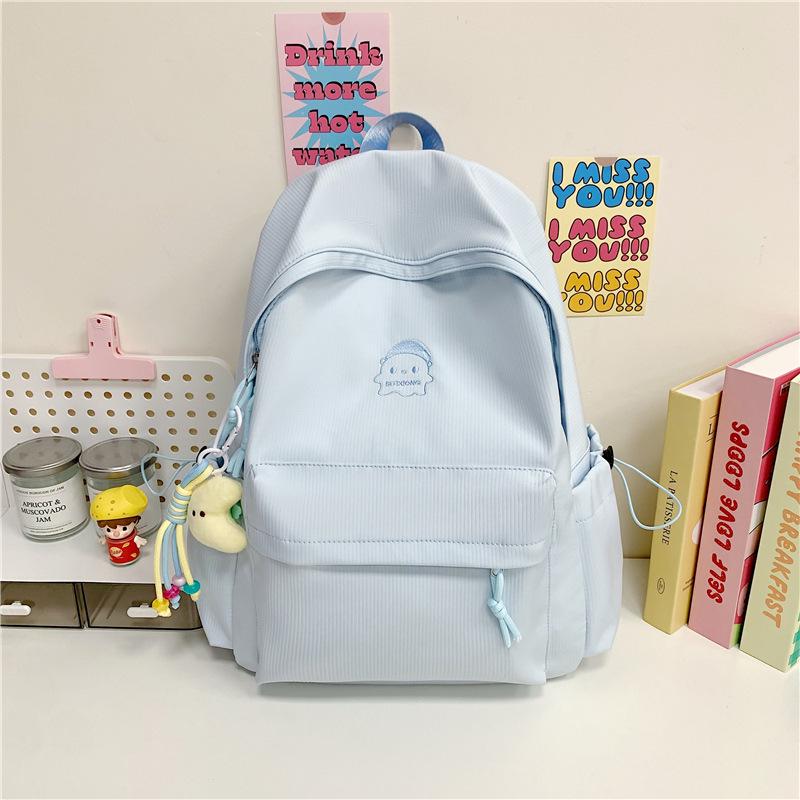 

Однотонний студентський рюкзак у корейському стилі для жінок: Універсальний, Легкий та Простий для Поїздок до Коледжу. Without pendant синій