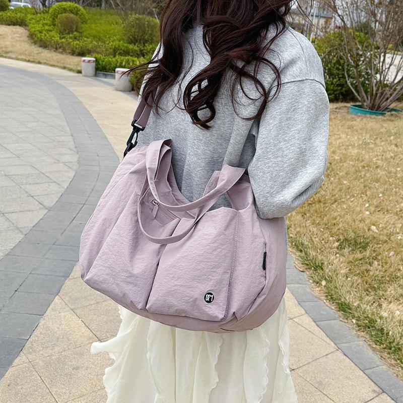 Tote bag Large capacity short trip bag Outdoor sports handbag Women's light commuter casual versatile oblique span bag