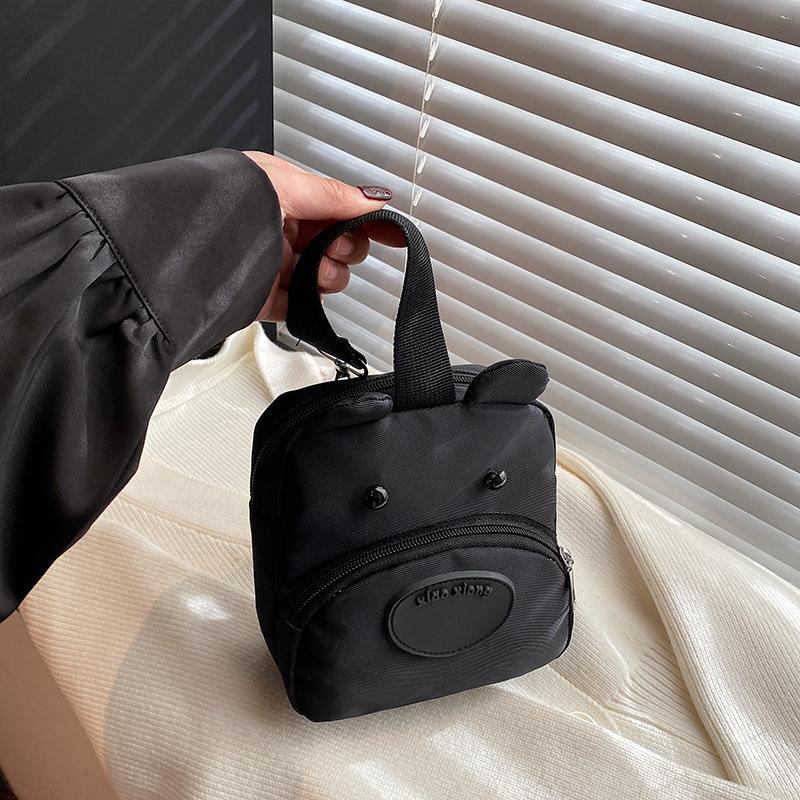

Small bag female new dog change handbag cartoon cute ugly cute student holding mobile phone bag small square bag чёрный