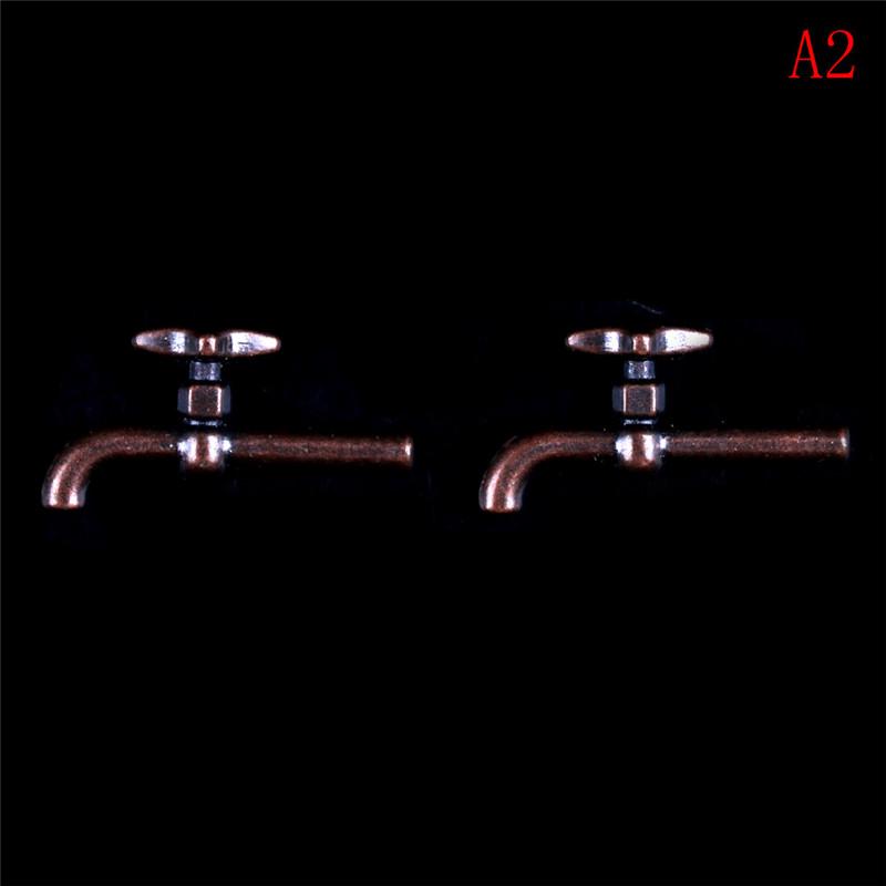 

2Pcs Miniature Alloy Water Tap Faucet Dollhouse Home Kitchen Shop Ornament 1:12 as the picture
