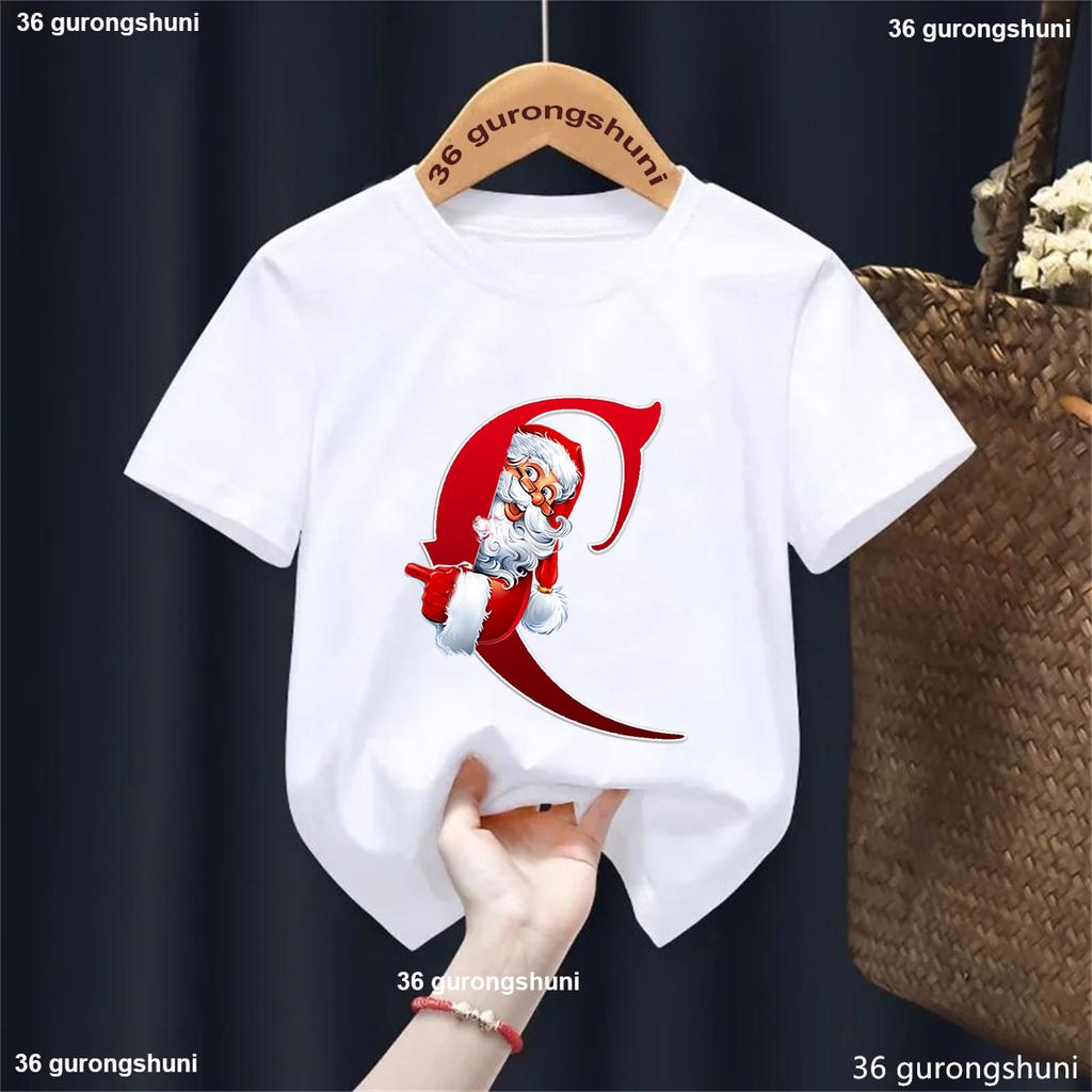 Lustiges Weihnachtsmann 26 Buchstaben T-Shirt Geburtstag Name Geschenk T-Shirt Frohes Neues Jahr 2025 Partygeschenk Jungen Mädchen Kinder Kleidung Oberteile