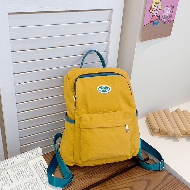 

Kids Trendy Nylon Backpack With Curved Shoulder Straps For Middle School Students Yellow