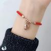 Fashionable Rose Gold Cat Bracelet with Red String for Women - Titanium Steel Jewelry.
