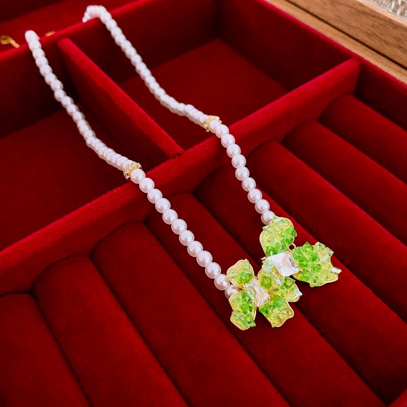 

Элегантное ожерелье с покрытием из настоящего золота, украшенное милым кристаллом циркония, искусственным жемчугом и цветочным дизайном - Нишевый темперамент высокого класса для женщин