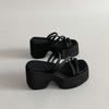 Thick-bottomed muffin black cool slippers 2025 spring and summer new women's fashion French beach vacation Rome cool