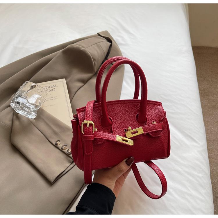 

Wholesale hot sale high-end temperament lychee pattern portable platinum bag women s leisure commuting style versatile light luxury messenger bag