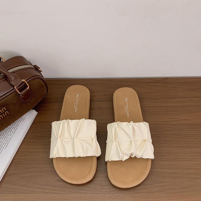 

Summer new wear simple pleated casual cool slippers women s flat-bottomed lazy retro beach one-word drag 40