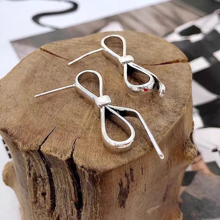 

PANJBJ 925 Sterling Silver Bowknot Studs Earring for Women Fashion Versatile Office Sweet Originality Jewelry Gift Dropshipping