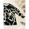 Women's large size with pocket design black and white abstract printed long-sleeved loose top, fashionable versatile casual T-shirt