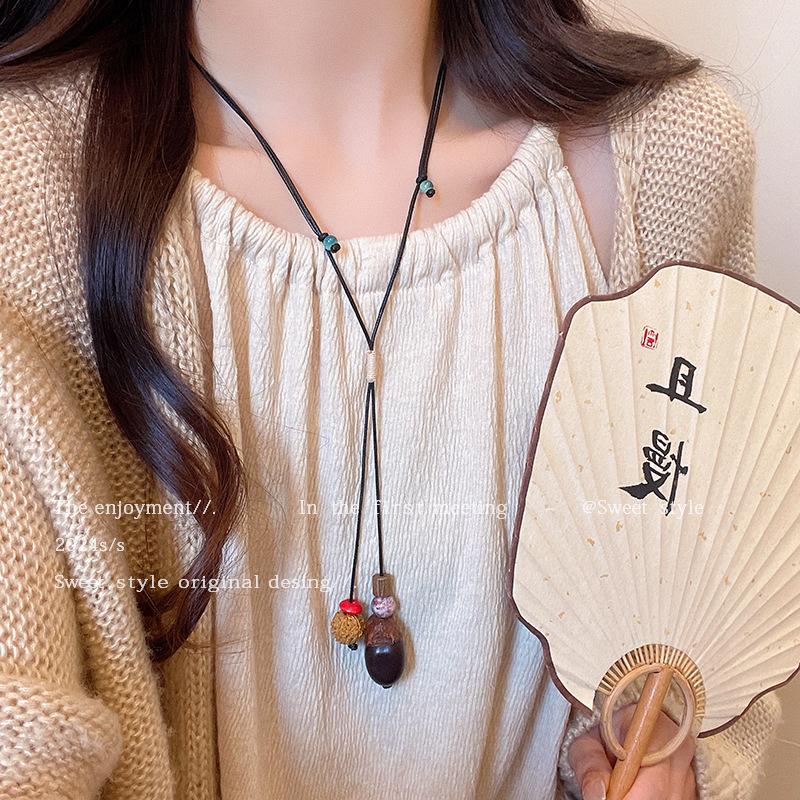 Autumn and winter retro pine nut woven necklace women's retro ethnic style fashion long sweater chain design sense