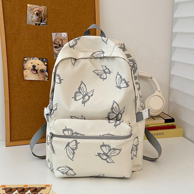 Schulrucksack Neuer Schmetterling Große Kapazität Modischer Rucksack Lässiger Vielseitiger Rucksack für Männer und Frauen High-School-Schüler Campus-Schüler-Tasche Großhandel